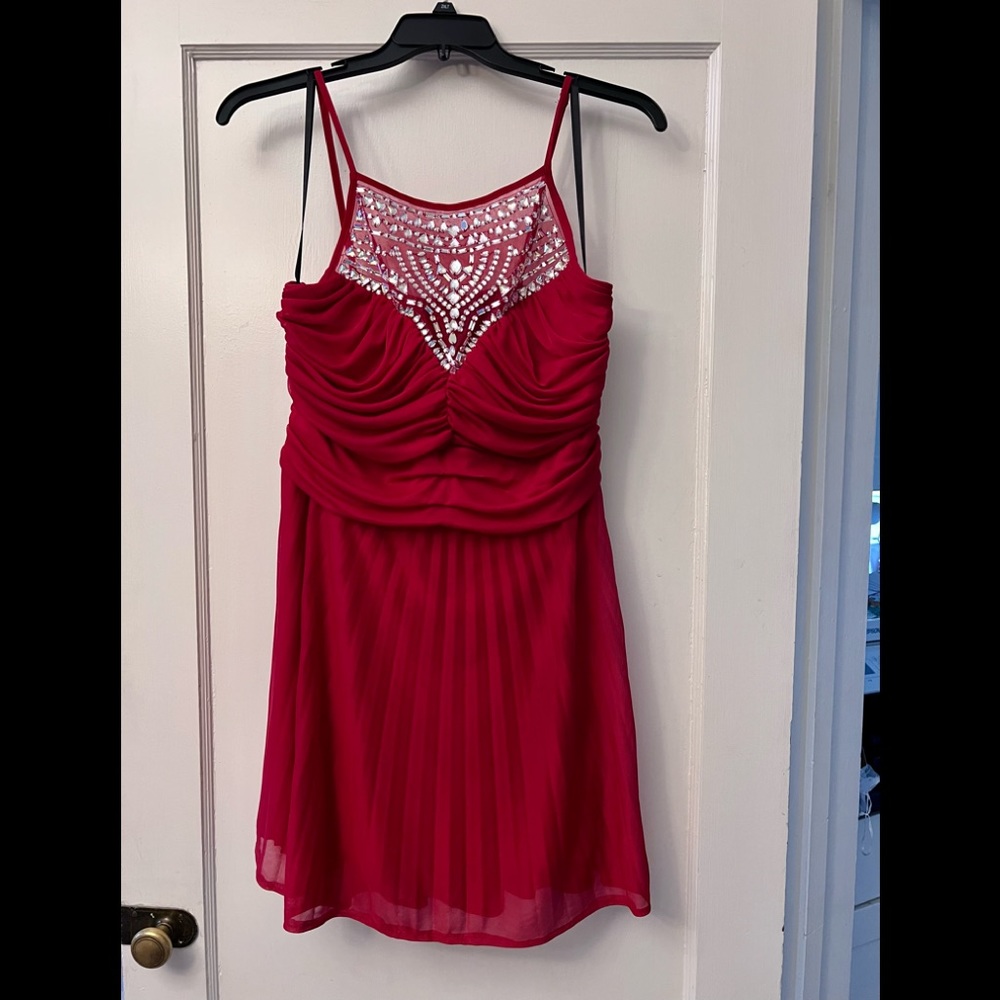 Red cocktail dress with beaded bodice, built in bra. Pleated skirt - Worn once!